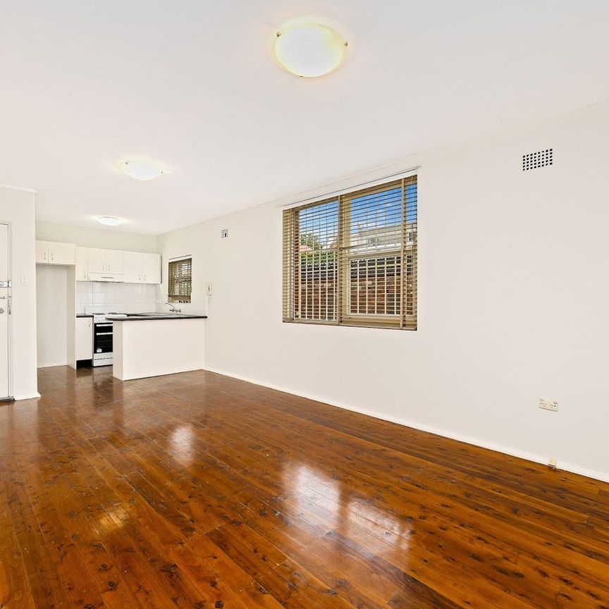 Sun-Filled Apartment with Parking in Lifestyle Location - Photo 1