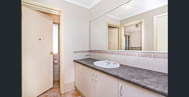 Three-Bedroom Family Home in Convenient Location! - Photo 1