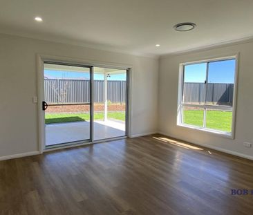 Stylish Four Bedroom Home in Southlakes Estate - Photo 1