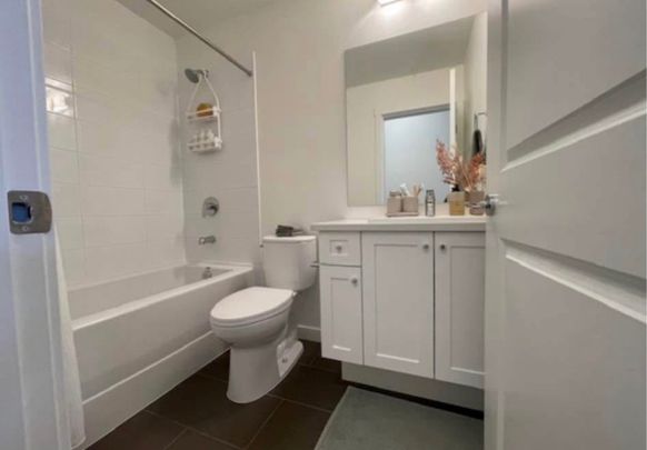 Unit 114- Beautifully Designed/ 2 Bedrooms Plus Den Condo at The Grove - Photo 1