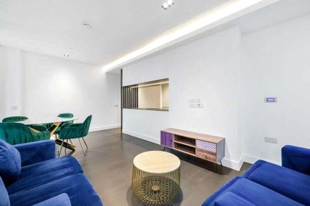 This stylish furnished two bedroom apartment sits in the prestigious Amory tower, offering contemporary living in the heart of Canary Wharf. - Photo 2