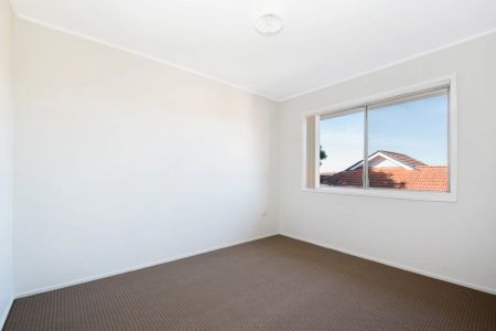 Well-Located Two-Bedroom Apartment with Carport - Photo 2