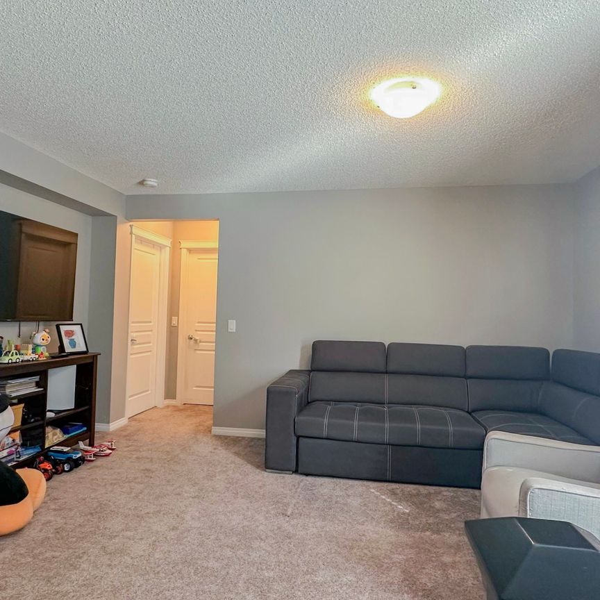 Stylish Auburn Bay Duplex With Garage & Newly Finished Basement - Photo 1