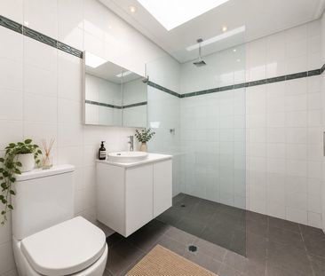 Versatile dual level living with coastal views - Photo 6