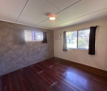 Neat Three Bedroom Home with Shed Plus Huge Deck - Photo 6