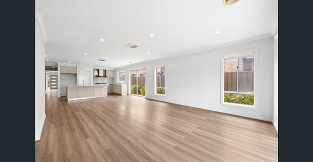 Charming Family Home in a Thriving Location - Photo 1