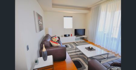 Fully Furnished 2-Bedroom Apartment with Breathtaking City Views - Photo 3