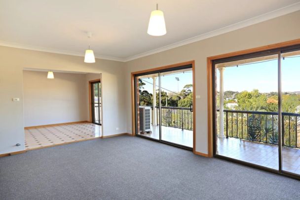 Light-Filled Apartment Offering Comfort and Convenience - Photo 1