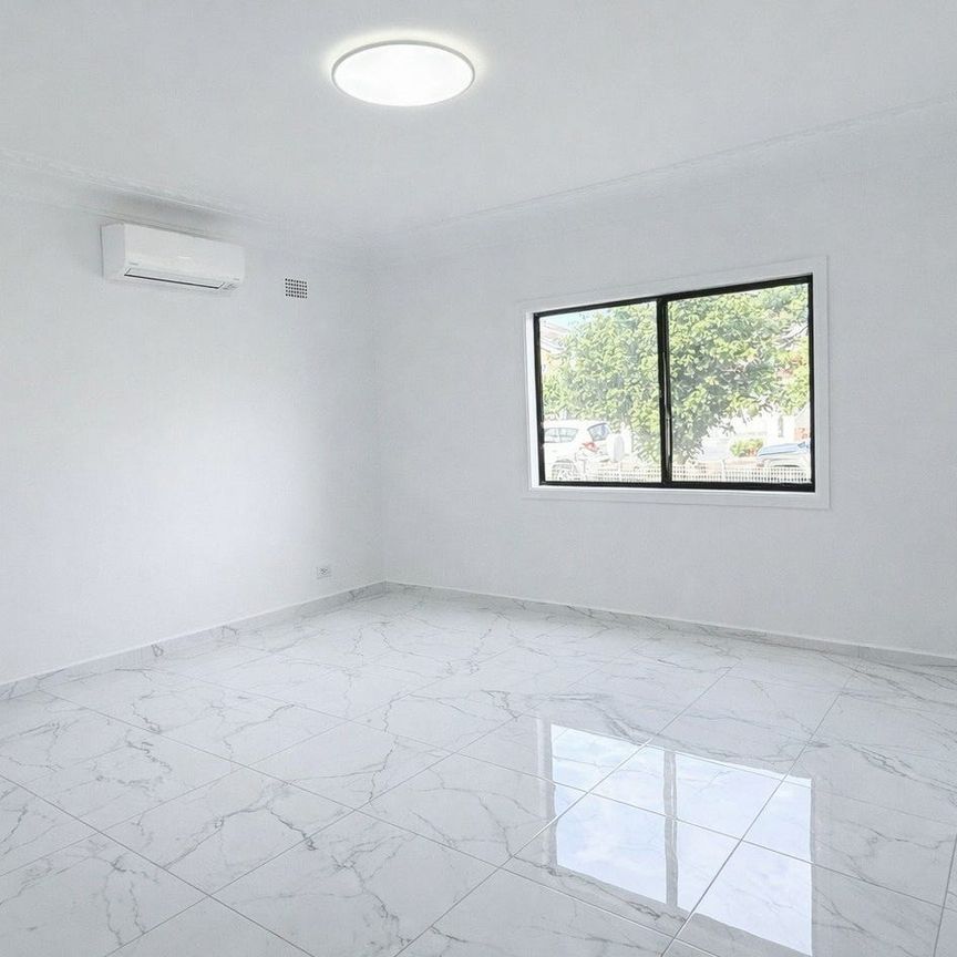 Spacious Fully Renovated 4-Bedroom Home in a Quiet Location - Photo 1