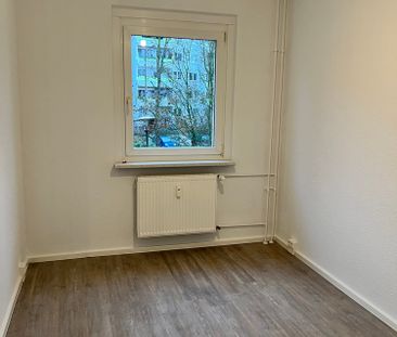 Ihre Familienwohnung mit tollem Ausblick vom Balkon - Foto 1