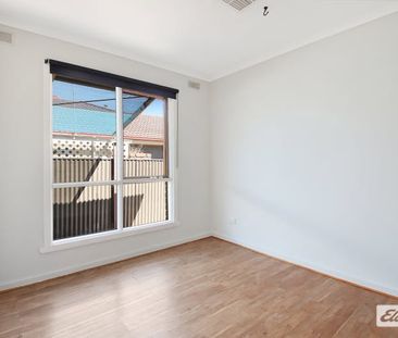 Charming 4-Bed, 2-Bath Home with Modern Upgrades & Spacious Backyard - Photo 6