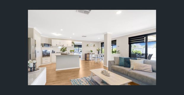 Impressive Family Home with Swimming Pool! - Photo 1