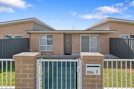Spacious Family Home with Stunning Outlook and Prime Lakeside Location! - Photo 4