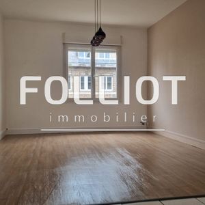 A LOUER - centre ville de VIRE AVEC BEL EMPLACEMENT - GRAND T2 DE 54,16 m² - Photo 2