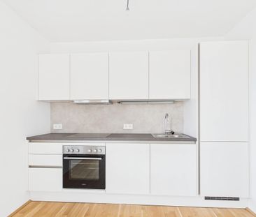 Moderne 3-Zimmerwohnung mit Balkon im Wildgarten - Foto 2