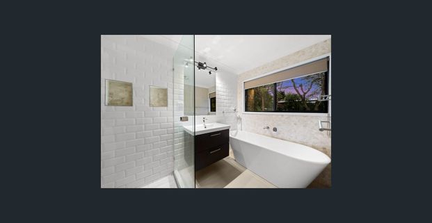 Stylish Family Living on a Generous 926m² Block - Photo 1