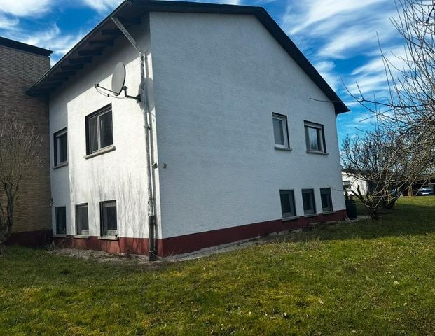 2,5 Zimmer-Souterrainwohnung auf Aussiedlerhof - Foto 1