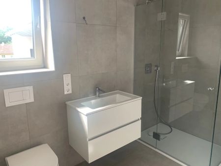 Erstbezug: Traumhafte Maisonette mit großzügigem, überdachtem Balkon - Photo 4