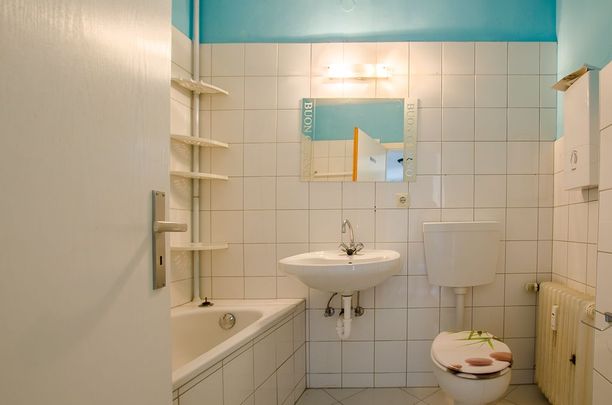 Stadtnahe Etagenwohnung mit Balkon - Foto 1