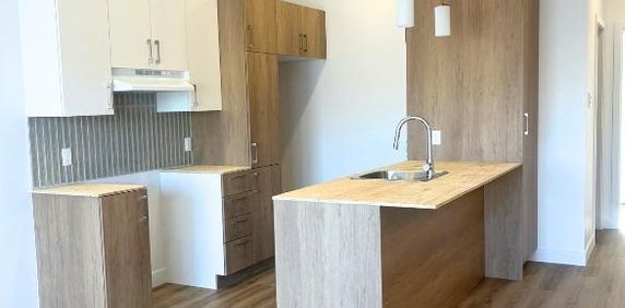 3 1/2 condo locatif neuf - Photo 2