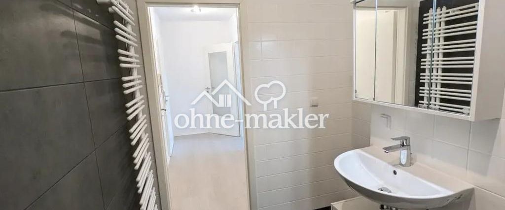 Exklusive 2,5-Zimmerwohnung mit herrlichem Blick ins Grüne mit TG-Stellplatz - Foto 1