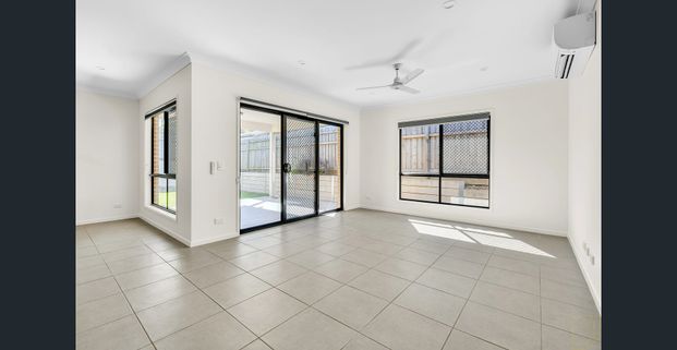 Immaculate Family Home with Versatile Media Room - Photo 1