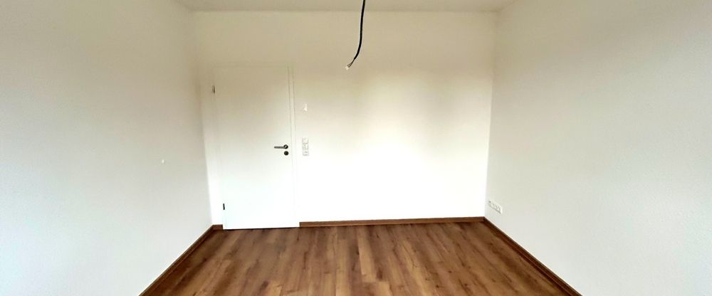 Augustfehn: Große Obergeschosswohnung mit Lift und Einbauküche | 91m² | KfW 40 - Photo 1