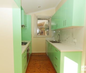 Comfortable 4 Bedroom Family Home - Photo 4