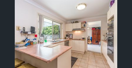 Spacious Family Home with Multiple Living Spaces - Photo 2