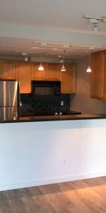 2 bedroom plus den, 2 bathroom condo - has it all! - Photo 3