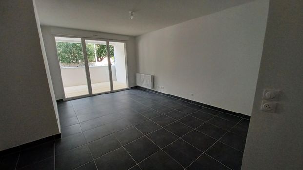 location Appartement T3 DE 57.2m² À NIMES - Photo 1