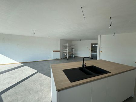 Nieuwbouw gelijkvloers appartement met 1 slaapkamer en tuin - Photo 3