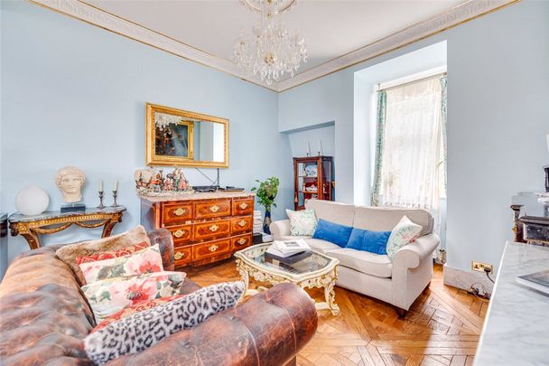 A unique double-aspect fourth floor flat (without lift), lovingly refurbished by the owners offering a bright and spacious Chelsea pied-a-terre. Minimum Tenancy Length: EPC rating E | Council Tax Band G - Photo 1