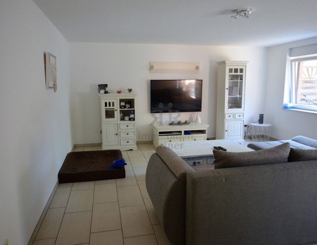 Schicke 2-Zimmer-Wohnung mit eigener Terrasse und Stellplatz! - Foto 1