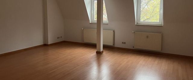 Perfekte Dachwohnung mit groÃem Balkon und tollen Blick in den grÃ¼nen Innenhof! - Foto 1