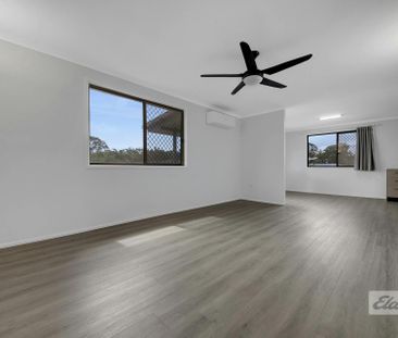 THIS PROPERTY OFFERS LOW MAINTENANCE LIVING WITH A SPACIOUS YARD , ... - Photo 3