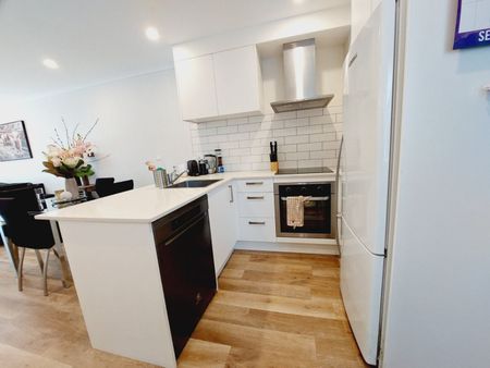 Stylish 2-Bedroom Home with Modern Comforts & Private Outdoor Spaces - Photo 4