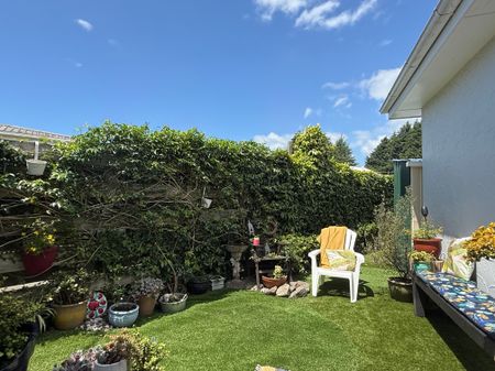 Character 1950s Cottage with Modern Comforts - Photo 5