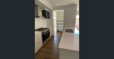 Modern 4-Bedroom Home in a Peaceful Estate - Photo 4