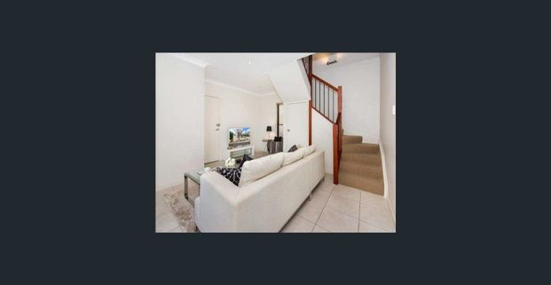 Conveniently located 2-story townhouse. - Photo 1