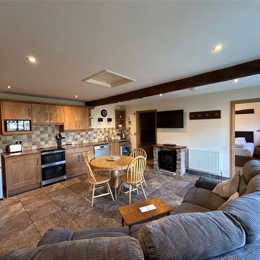 Available now, The Cartshed is beautifully presented, two bedroomed barn conversion situated on the outskirts of Knaresborough whilst occupying a delightful semi-rural position and available either furnished or unfurnished. - Photo 1