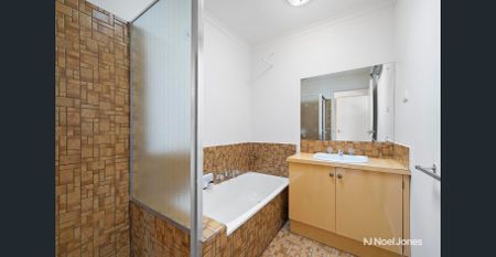 CONVENIENTLY LOCATED, FRESHLY UPDATED TWO-BEDROOM UNIT - Photo 2