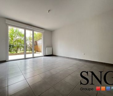 T2 AVEC TERRASSE ET JARDIN + PARKING - Photo 4