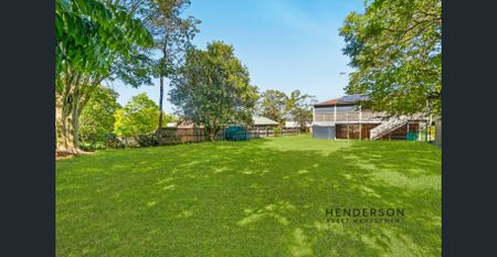 CHARMING HIGH-SET HOME WITH HUGE YARD & POTENTIAL - Photo 5