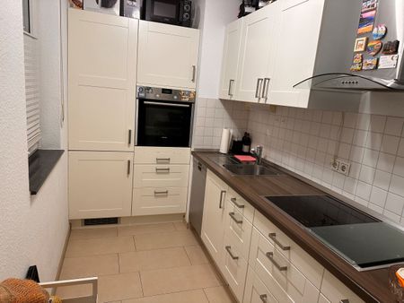 Gepflegte Erdgeschosswohnung mit Terrasse und Tiefgaragenstellplatz - Photo 3