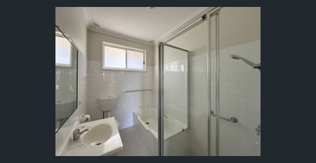 Charming Brick Home with Elegant Interiors and Low Maintenance Courtyard - Photo 4