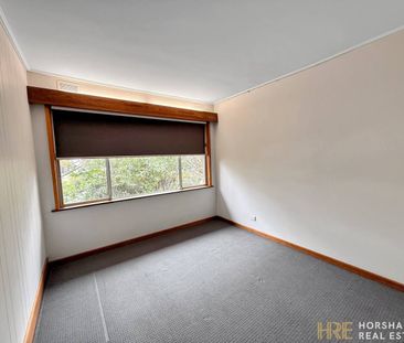 Modern 4-Bedroom Home Near the River - Photo 2