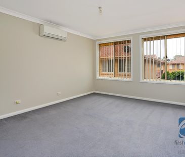 LOCATED IN A QUIET COMPLEX - Photo 2