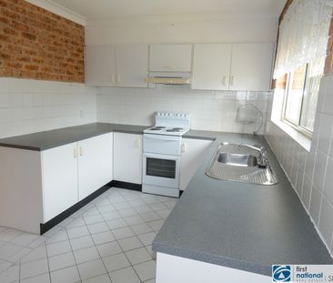 Well Appointed Ground Floor Two Bedroom Unit - Photo 4