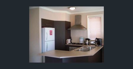 SPACIOUS FAMILY HOME IN A HANDY POSITION - Photo 2